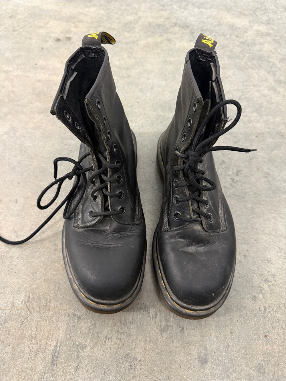 Dr. Martens Black Leather Combat Boots with Yellow Heel Loop Detail
